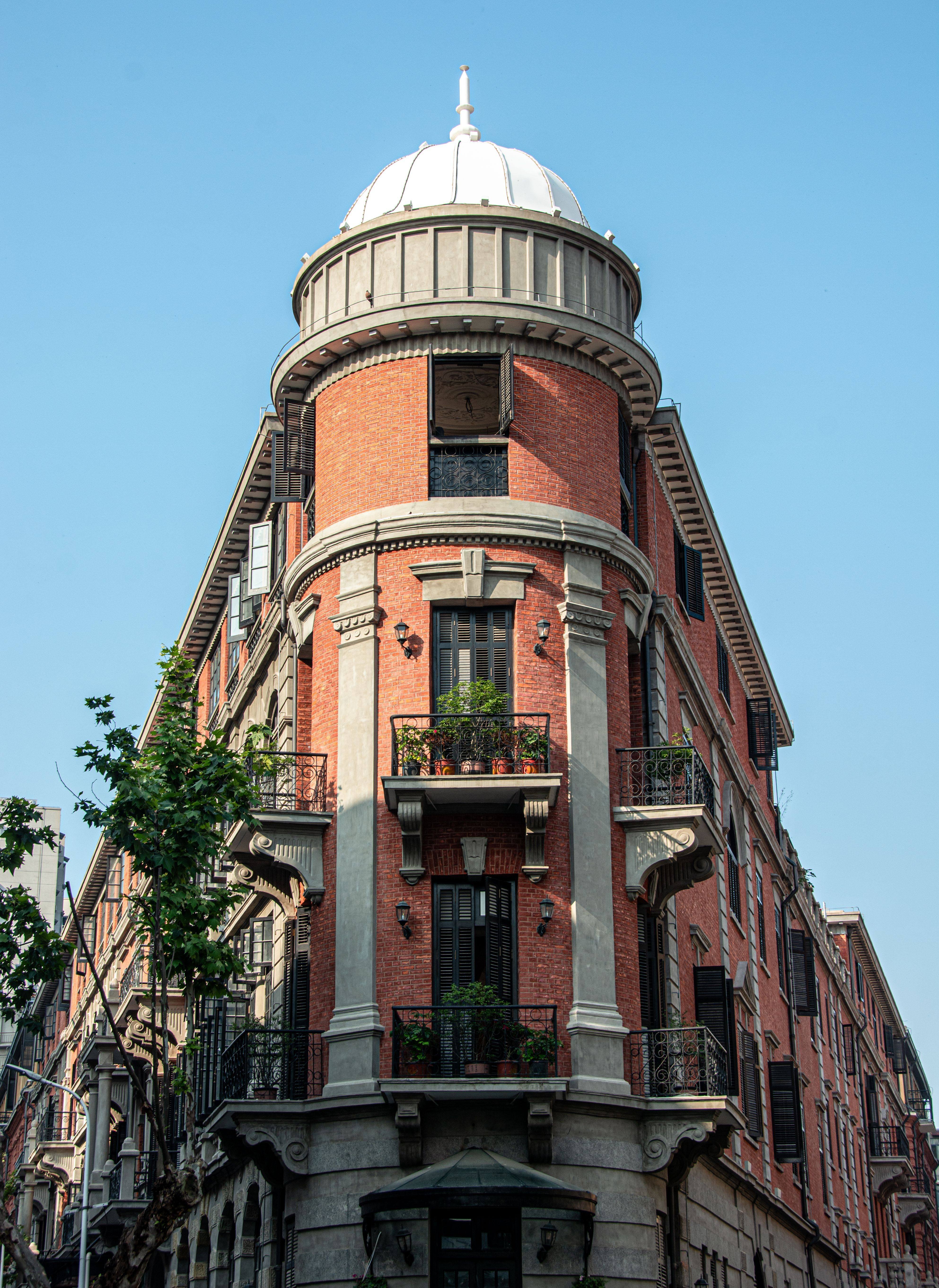 historic-red-brick-building-with-ornate-balconies-2025-02-10-06-37-08-utc-2